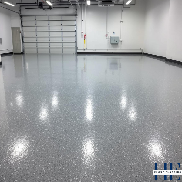 High-gloss solid gray epoxy coating applied in a Keilor Park workshop or garage.