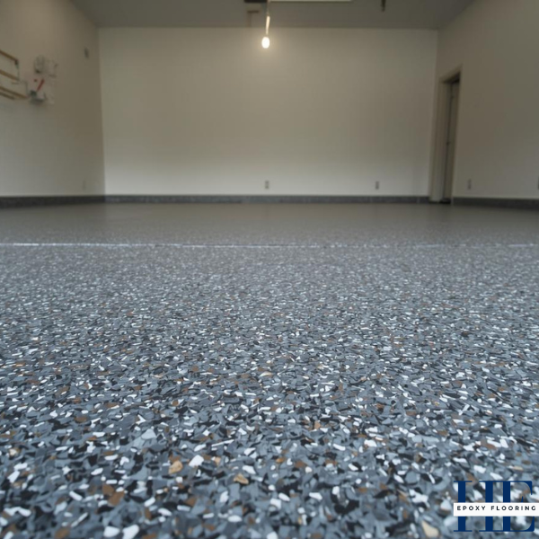 Finished durable epoxy flake floor resisting high traffic and grime in a Tullamarine residential garage.