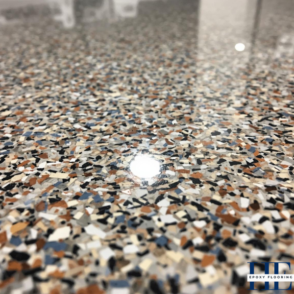 Close-up shot emphasizing the durable, heat-resistant topcoat of the flake epoxy.