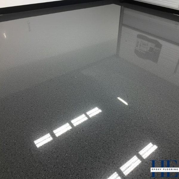 High-gloss plain epoxy flooring system installed by epoxy installers Melbourne for a modern finish in Essendon.