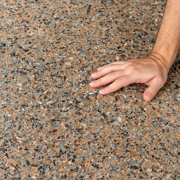 Close-up of durable, slip-resistant full flake garage epoxy system.