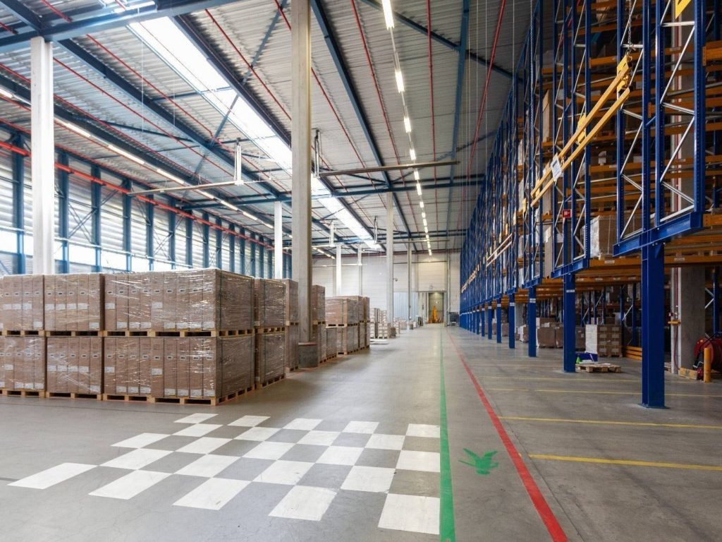 Clean gray epoxy flooring in a Melbourne warehouse